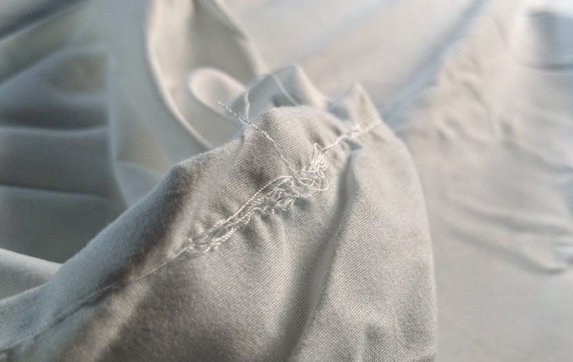 this spiderweb of loose ends on the bare home flat sheet is by far...