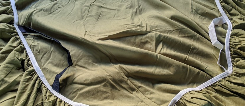 fitted sheets - color-coded straps for the head/foot of the bed is a nice touch to...