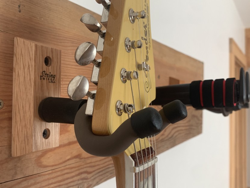 guitar stand - the curved arms ensured that instruments were secure and protected a...