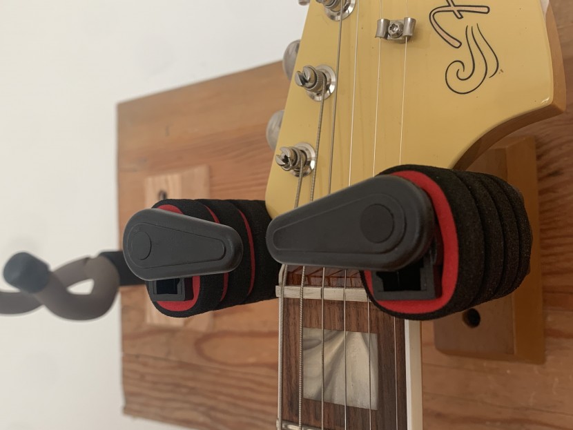 guitar stand - the automatic security arms and padding were great safety features...