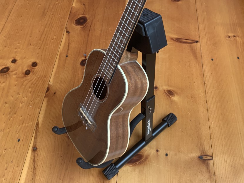 guitar stand - adjustability allowed this unit to be able to hold a small ukulele.