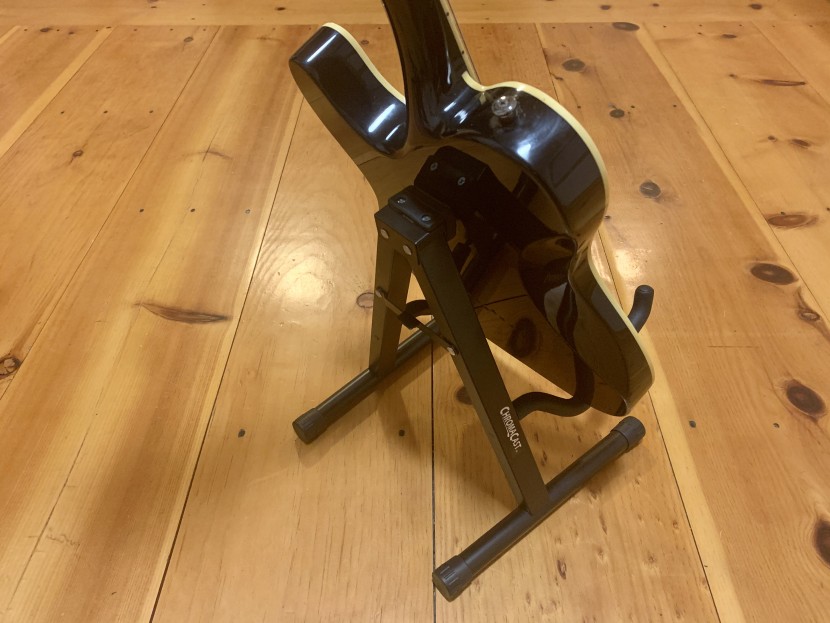 guitar stand - a simple hinge on the back allows for quick and easy assembly and...