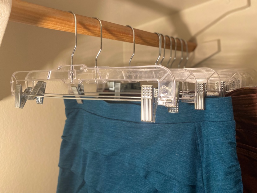 clothes hangers - a simple and stackable skirt and pants hanger with a wide length.