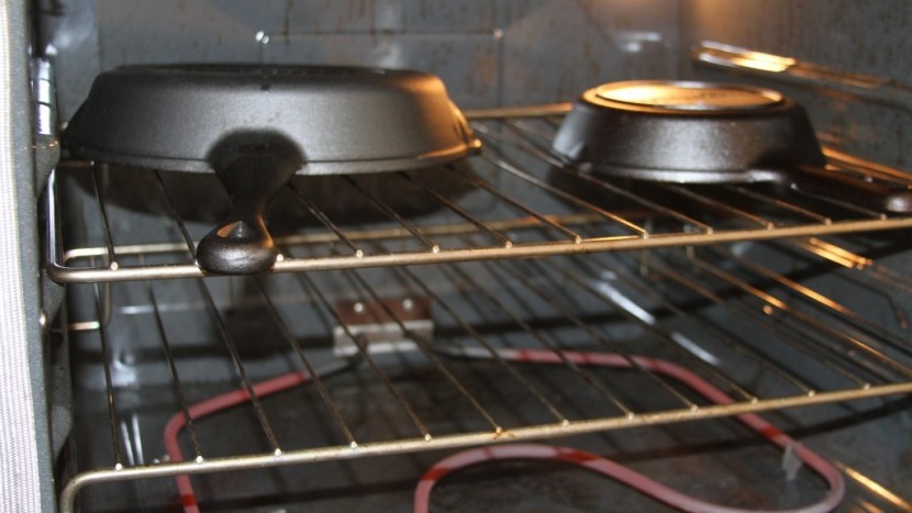 cookware set - here we see the cast iron pans going through the seasoning process...