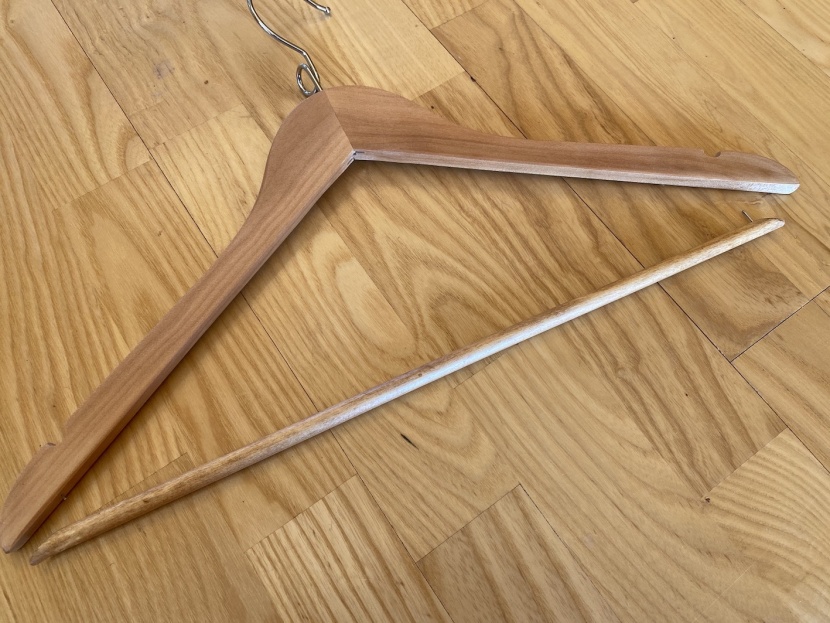 clothes hangers - while the arms of these wooden options are quite hefty and durable...