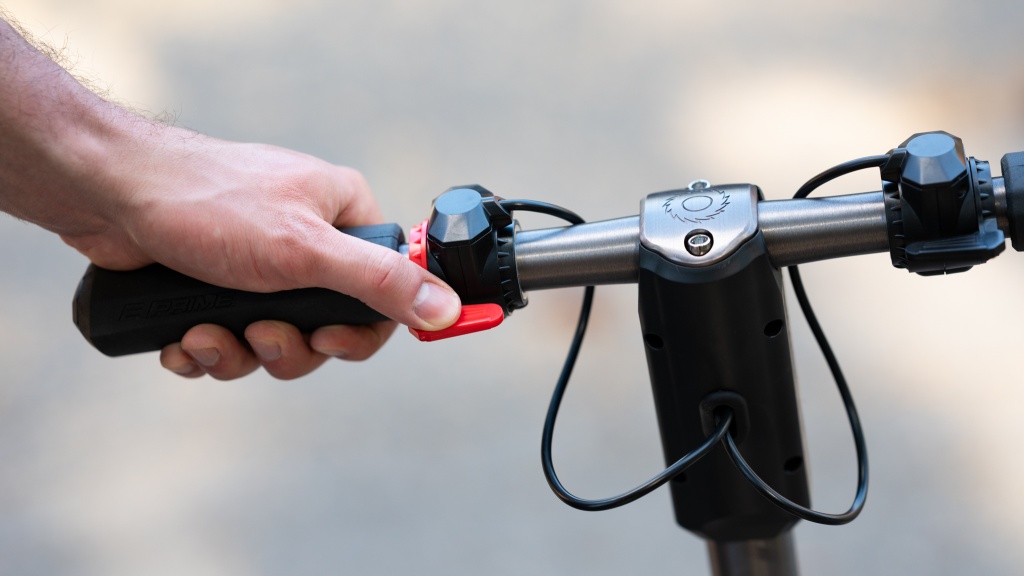 razor e prime iii - the electric front brake is paddle actuated and easy to opperate.