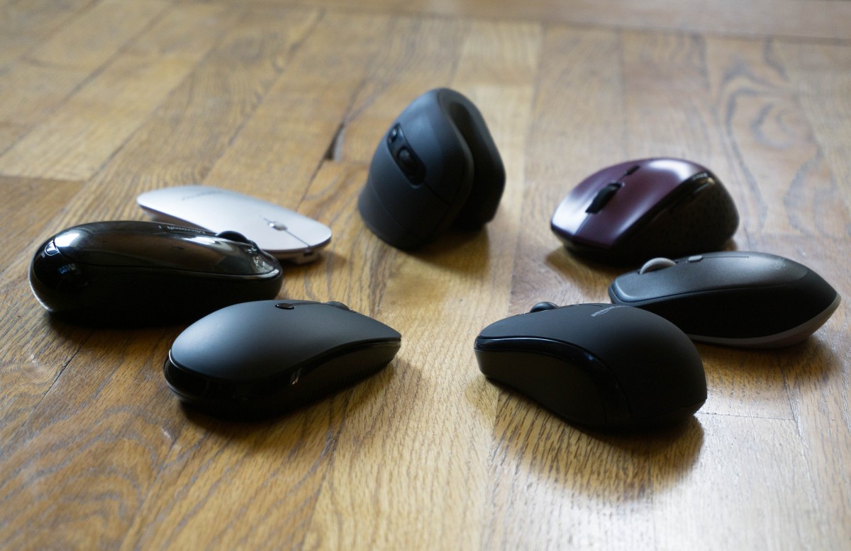 Why wireless gaming mice still use RF receivers instead of Bluetooth