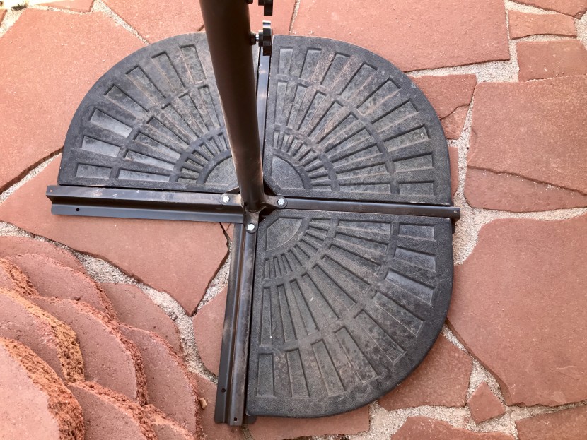 cross base umbrellas are heavier, but we found them easier to set up...