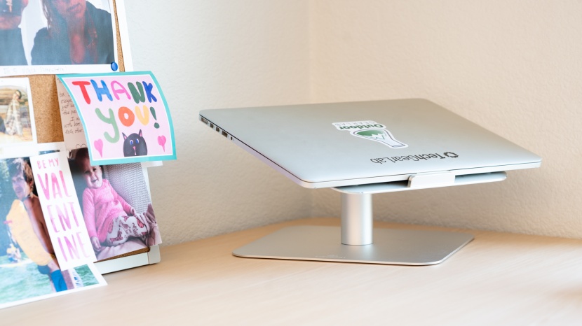 the lamicall laptop riser has a sleek look and also rotates.