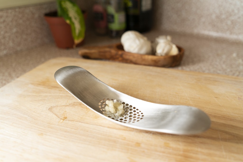 Kitchen Innovations Garlic-A-Peel Garlic Press, Crusher, Cutter, Mincer,  and Storage Container - Includes Silicone Garlic Peeler - Easy to Clean 