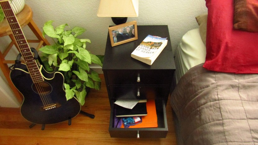 nightstand - this night stand comes with three solid drawers to keep everything...