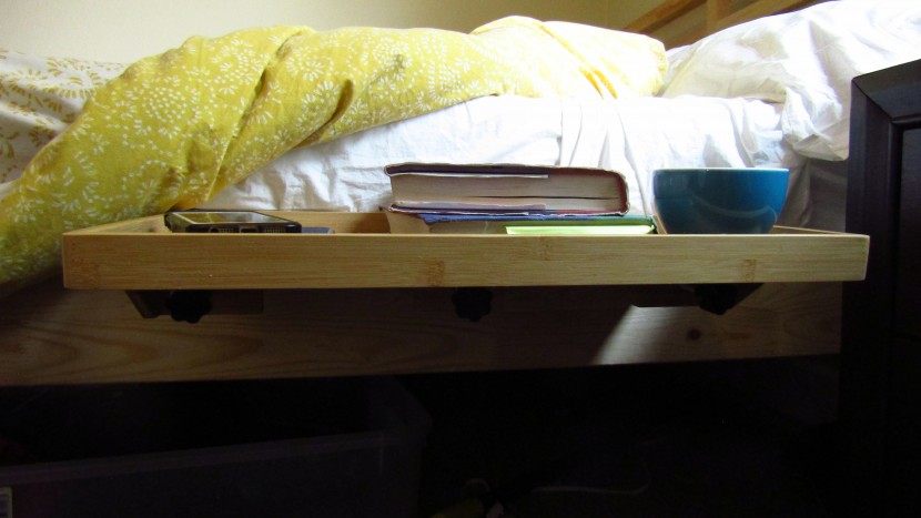 nightstand - this bed shelf has plenty of space for bedside essentials.