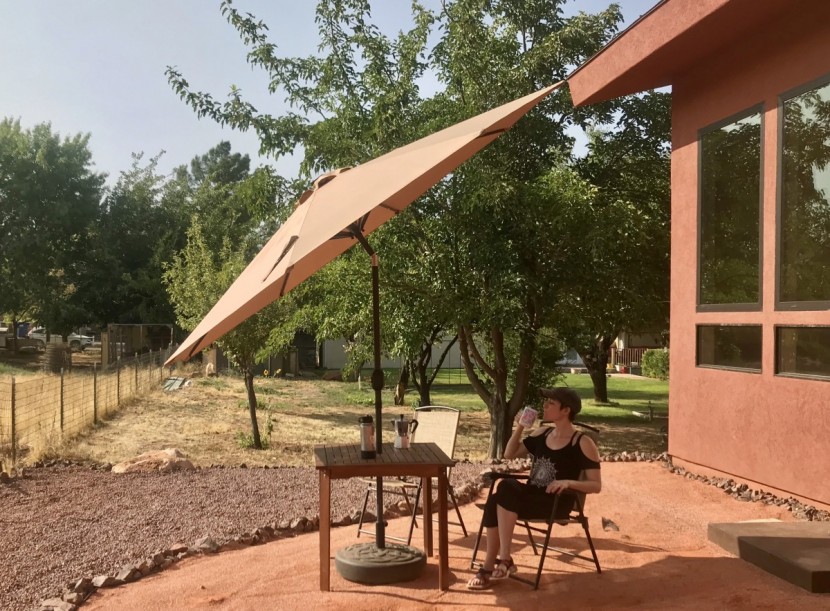 patio umbrella - the best choice products patio umbrella has a wide, dark shade and a...