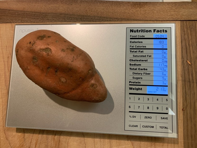 kitchen scale - the greater goods nourish displaying the weight and nutritional...