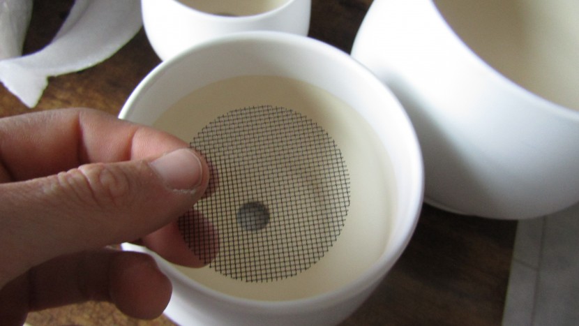 garden pot - the le tauci plant pots come with small mesh hole covers.