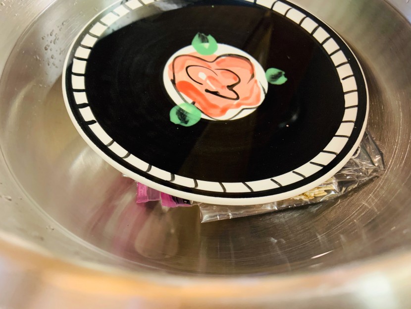 food storage bags - we used a heavy ceramic plate to ensure the bags stayed fully under...