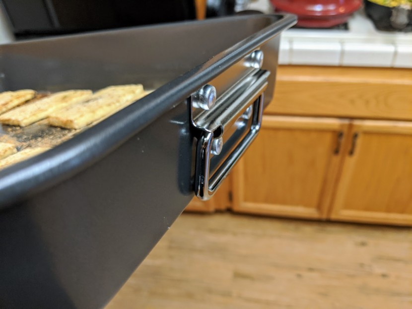 roasting pan - the fold-down handle of the faberware helps with convenient storage...