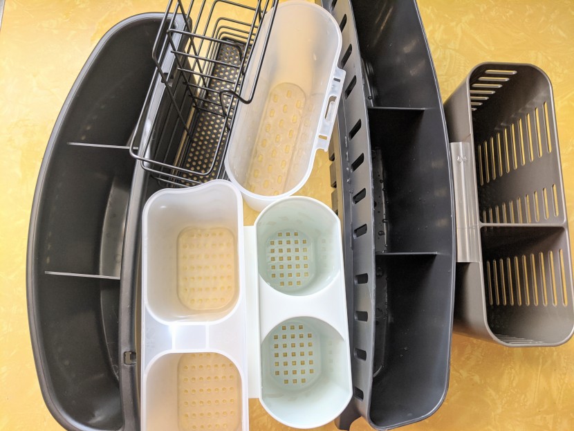 dish rack - the multiple types of silverware caddies are seen here. the...