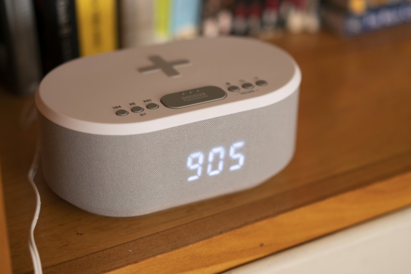 this clock has a 6w speaker that makes up a large part of its body...