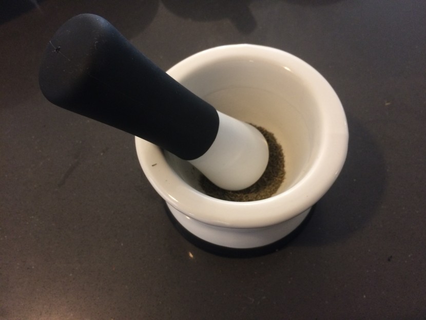 mortar and pestle - the cooler kitchen ez grip has a comfortable rubber coated pestle.