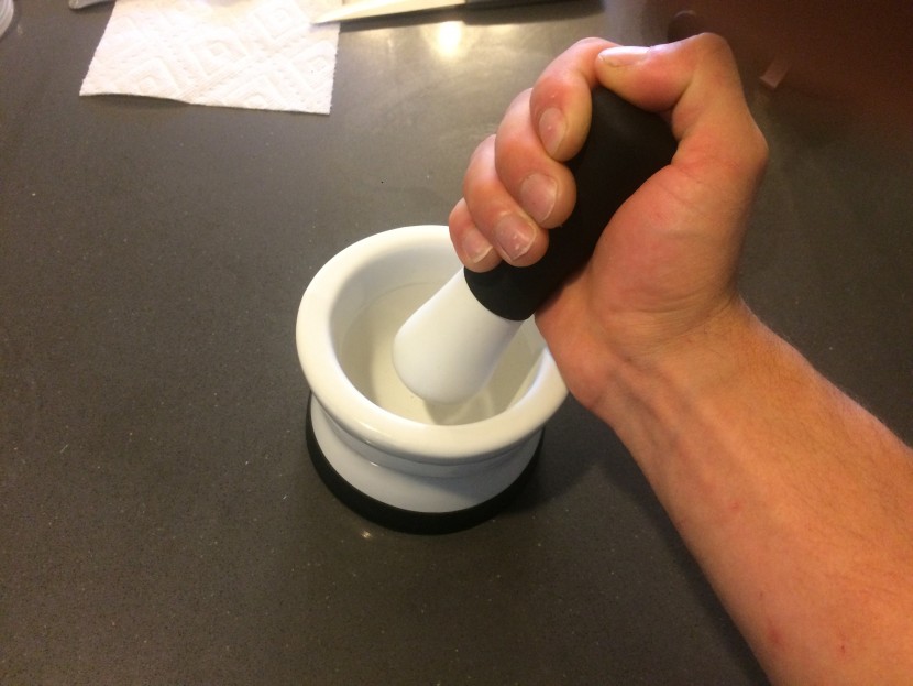 mortar and pestle - enjoying the comfort provided by the cooler kitchen ez-grip.
