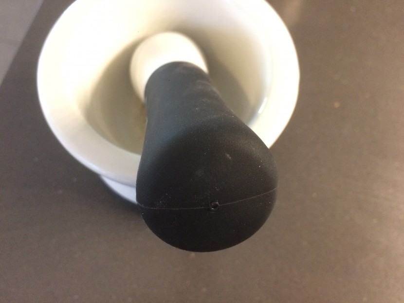 mortar and pestle - the rubber lined pestle and mortar bottom of the cooler kitchen...