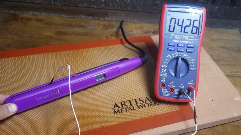 measuring the maximum temperature using a thermocouple.