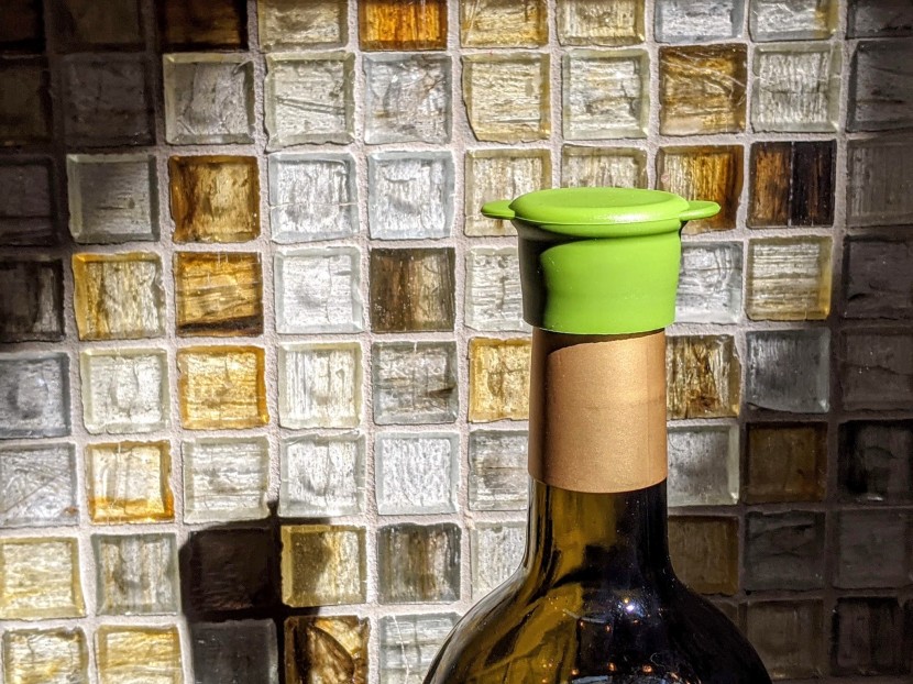 wine stopper - this is a flexible stopper that goes over the bottle opening to fit...