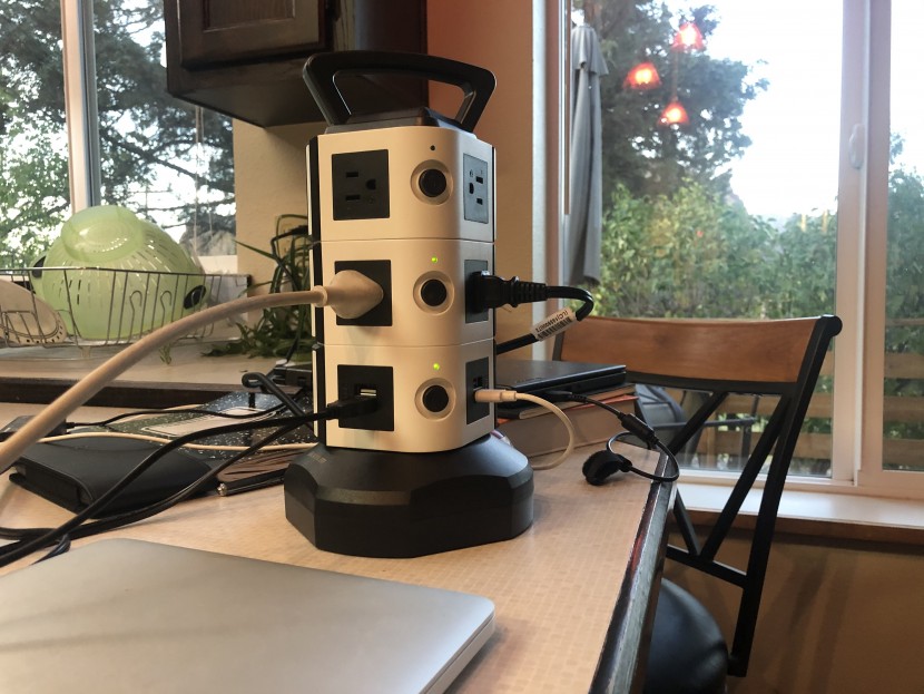 surge protector - this unique tower-style model is perfect for communal workspaces...