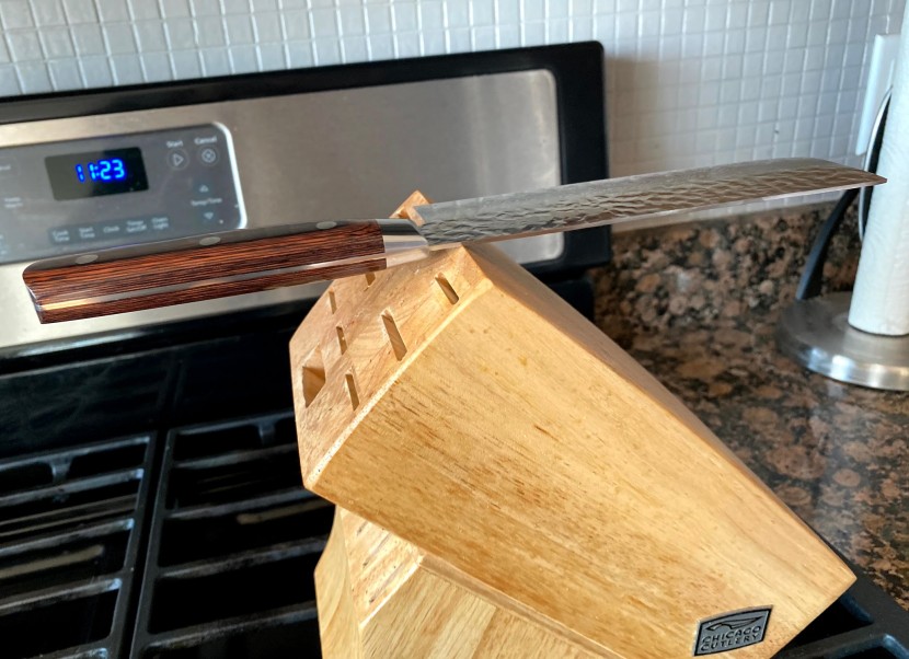 nakiri knife - we balanced each model, marked its center point of mass, and...