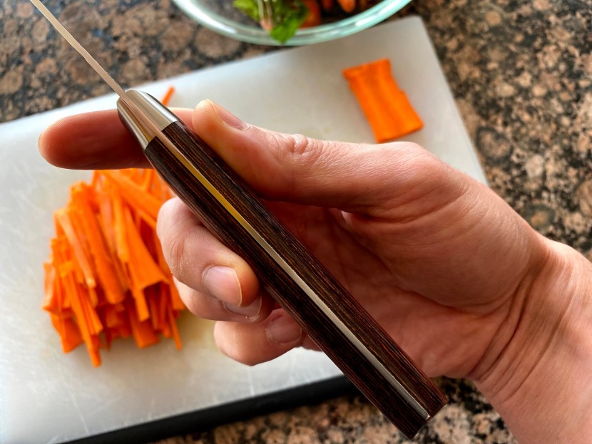 this is an example of a full-tang model, meaning that the metal runs...