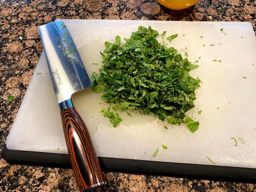 nakiri knife - this single-bevel knife is heavy and does an okay job with delicate...