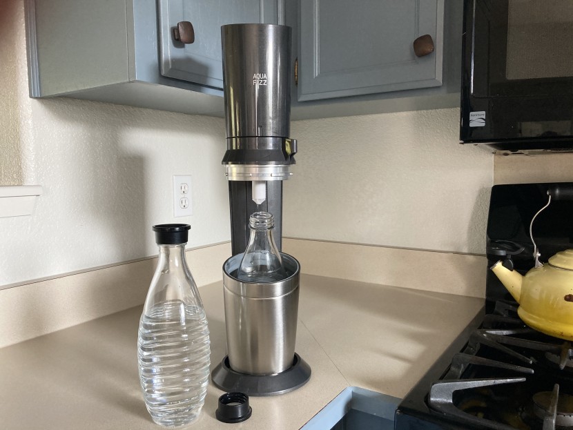 soda maker - the aqua fizz is very tall when open, and fits under the cabinets...