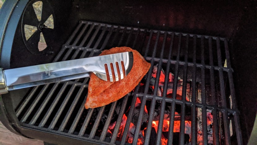 grill tools - the unique clamshell design of the tongs included in the...