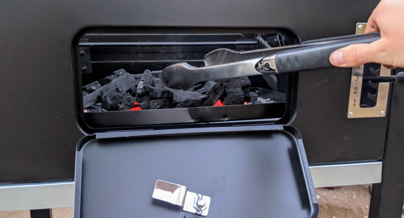 grill tools - the extra-long tongs of the weber 3-piece set are ideal for reaching...