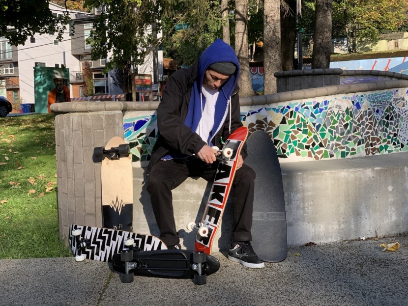 skateboard - adam making some adjustments to the trucks on the baker while testing