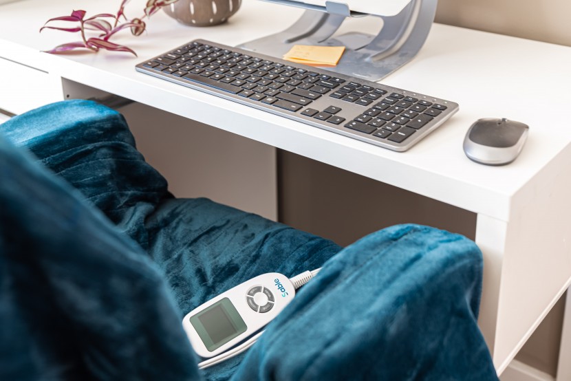 we like leaving a heated blanket on the office chair so it can be...