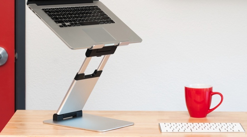 laptop stand - the main arm on the nulaxy c5 extends so that you can fully stand up...