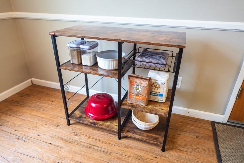 bakers rack - understated framing and a tasteful wood laminate make this a...