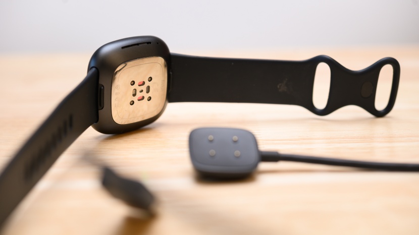 fitbit sense - the charger for this watch clips very securely into place.