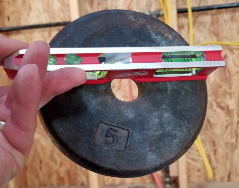 torpedo level - the strongest magnets picked up a five pound plate.