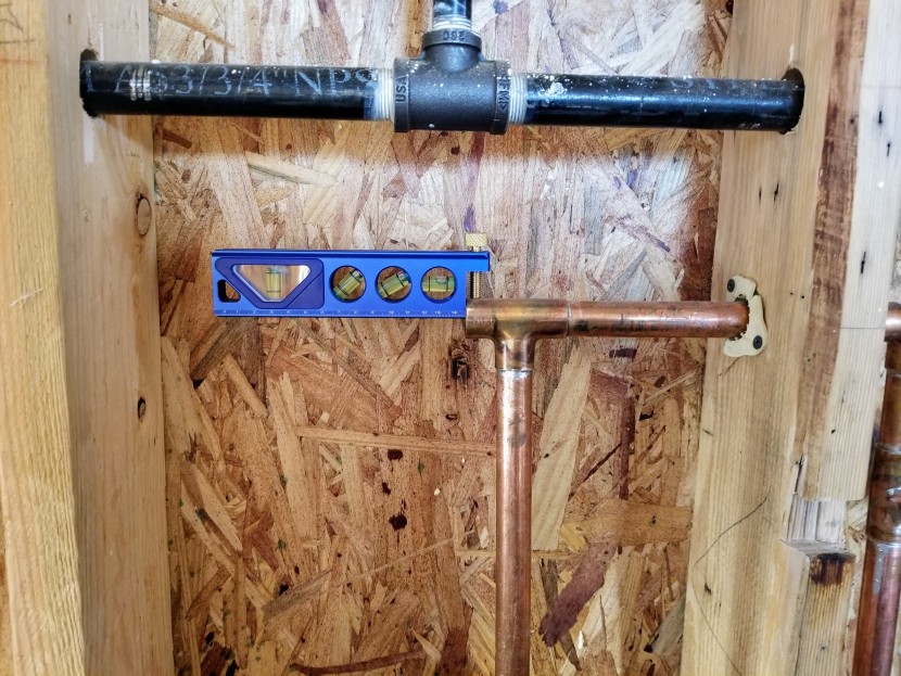 torpedo level - the conduit screw holds tight on many sizes of piping.