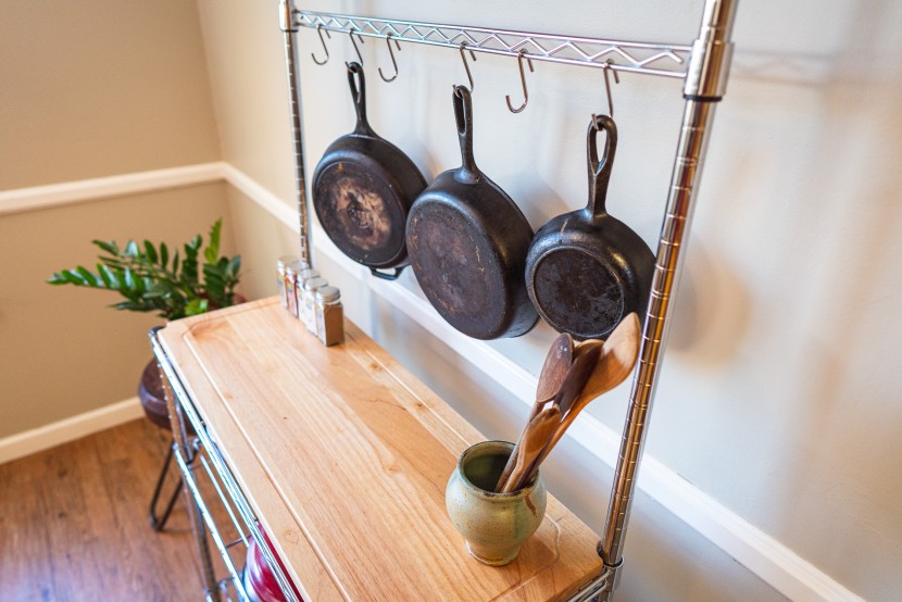 bakers rack - hooks sturdy enough to hang three cast iron skillets from.