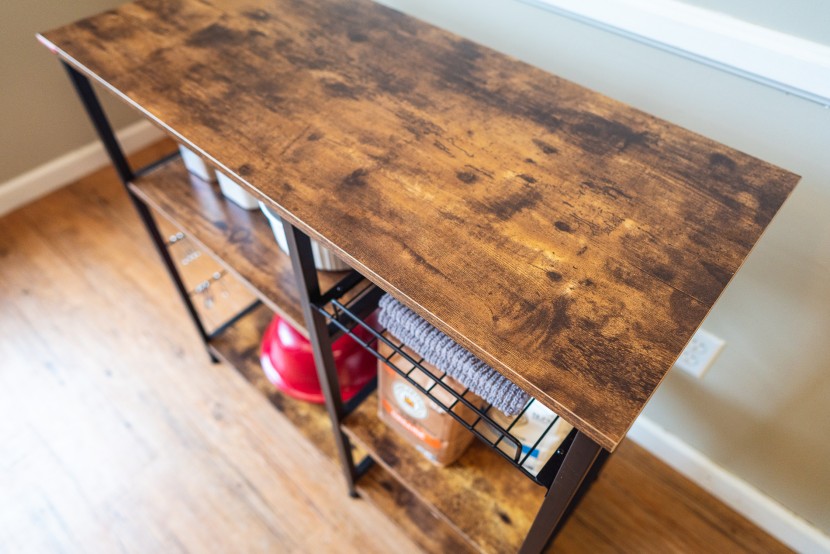 bakers rack - laminate wood finishes aren't as nice as the real thing, but we...