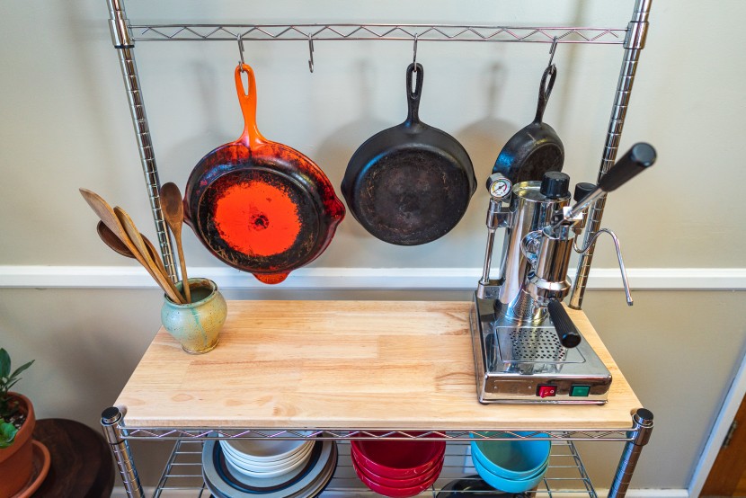 bakers rack - a real wood top and exceptional strength set the chrome racks apart.