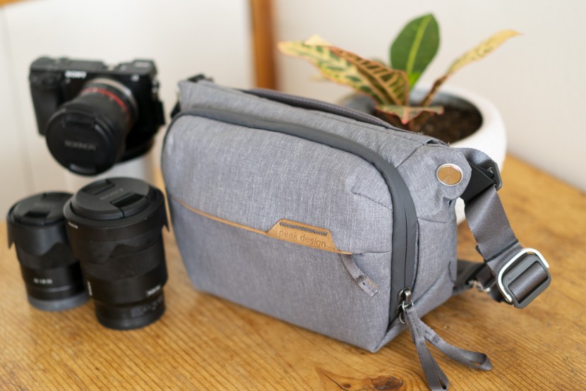 gifts for photographers - this handy sling can hold a large camera and one to two lenses in...
