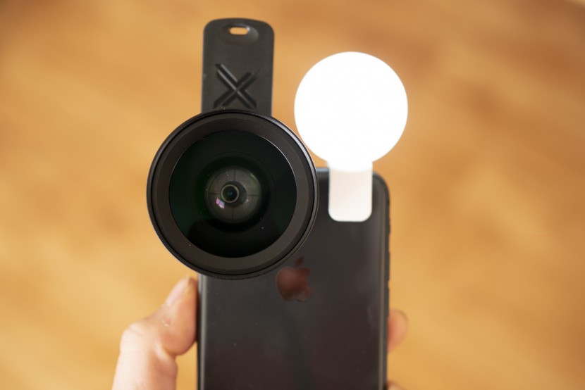 this clip-on lens expands the photographic capabilities of your...