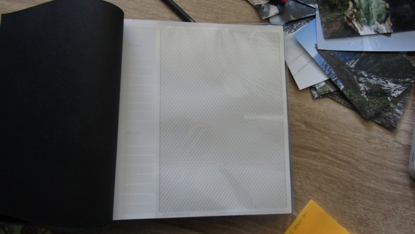 the pioneer fabric fram cover album has a photo slot of the front of...