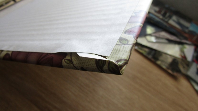 photo album - the pioneer magnetic self stick 3-ring album came glued incorrectly...