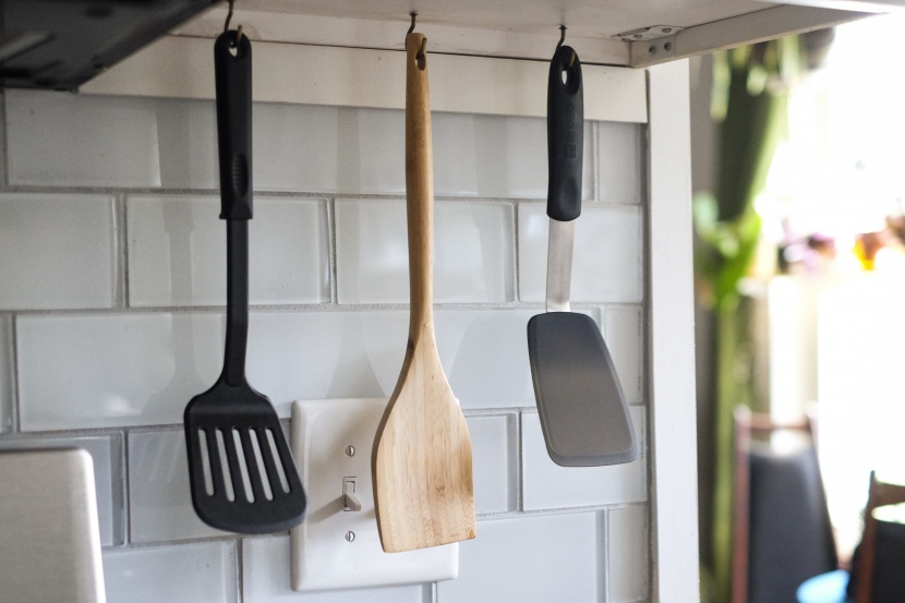 spatula - the norpro, totally bamboo, and di oro all have holes for hanging on...